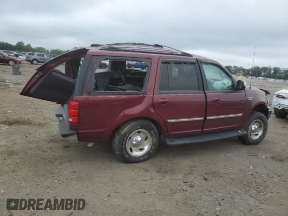 1999 Ford Expedition XLT with VIN 1FMPU18L6XLA61106, listed as a Copart auction lot 62688735 with 105,551 mi miles and Salvage title. Bid and sale history available at DreamBid. Image 3.