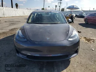 2023 Tesla Model 3 with VIN 5YJ3E1EA3PF541593, listed as a Copart auction lot 43926455 with 26,593 mi miles and Salvage title. Bid and sale history available at DreamBid. Image 5.