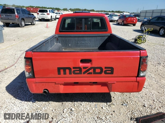 1991 Mazda B-Series Truck z VIN JM2UF3136M0148956, wystawiony jako Copart lot #47346325 z przebiegiem 71 241 mil mil oraz Szkoda całkowita • Salvage title. Historia ofert i sprzedaży dostępna na DreamBid. Obrazek 6.