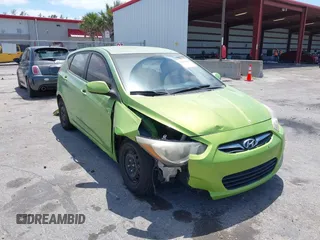 2012 Hyundai Accent SE with VIN KMHCU5AE4CU050210, listed as a IAAI auction lot 42134803 with 137,797 mi miles. Bid and sale history available at carsss.com. Image 6.