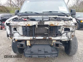 2012 Ford Econoline Cargo Commercial with VIN 1FTNE1EW0CDB10750, listed as a IAAI auction lot 41939696 with 180,042 mi miles. Bid and sale history available at carsss.com. Image 18.