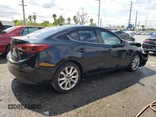 2014 Mazda 3 S Touring with VIN JM1BM1V39E1184958, listed as a Copart auction lot 48529135 with 171,367 mi miles and Salvage Title. Bid and sale history available at DreamBid. Image 3.