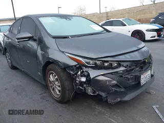 2022 Toyota Prius LE z VIN JTDKAMFP4N3202105, wystawiony jako IAAI lot #41751929 z przebiegiem 45 086 mil mil oraz . Historia ofert i sprzedaży dostępna na DreamBid. Obrazek 1.
