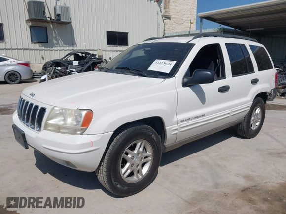 2003 Jeep Grand Cherokee Laredo with VIN 1J4GX48S43C518584, listed as a IAAI auction lot 42213094 with 163,743 mi miles and . Bid and sale history available at DreamBid. Image 18.