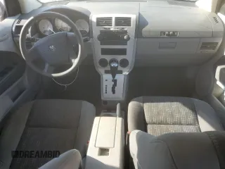 2007 Dodge Caliber with VIN 1B3HB28B07D111196, listed as a Copart auction lot 52488495 with 123,409 mi miles and Salvage Title. Bid and sale history available at DreamBid. Image 8.