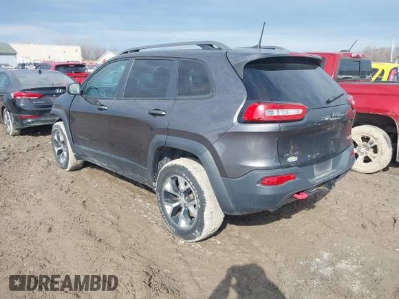 2017 Jeep Cherokee Trailhawk z VIN 1C4PJMBS0HW649422, wystawiony jako IAAI lot #41696815 z przebiegiem 62 185 mil mil oraz . Historia ofert i sprzedaży dostępna na DreamBid. Obrazek 3.