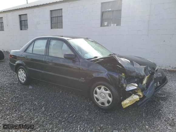 2001 Mazda Protege DX with VIN JM1BJ222510429507, listed as a Copart auction lot 78640074 with 145,735 mi miles and Salvage Title. Bid and sale history available at carsss.com. Image 4.