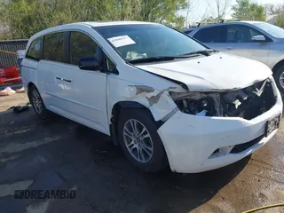 2012 Honda Odyssey EX-L with VIN 5FNRL5H62CB010054, listed as a IAAI auction lot 42040117 with 189,566 mi miles and . Bid and sale history available at carsss.com. Image 1.