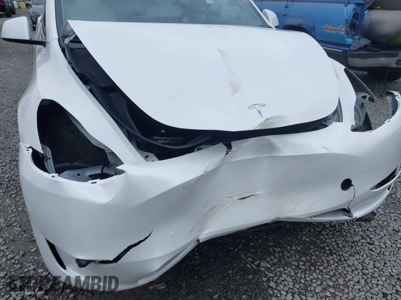 2023 Tesla Model Y Long Range z VIN 7SAYGAEEXPF647352, wystawiony jako IAAI lot #41955933 z przebiegiem Nie podano mil oraz . Historia ofert i sprzedaży dostępna na DreamBid. Obrazek 6.