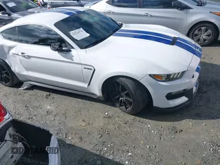 2017 Ford Mustang Shelby GT350 z VIN 1FA6P8JZ1H5523310, wystawiony jako IAAI lot #41575570 z przebiegiem 60 122 mil mil oraz . Historia ofert i sprzedaży dostępna na DreamBid. Obrazek 13.