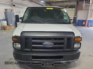 2010 Ford Econoline Cargo Commercial with VIN 1FTNE1EW4ADA91052, listed as a IAAI auction lot 42607935 with 163,519 mi miles and . Bid and sale history available at DreamBid. Image 4.