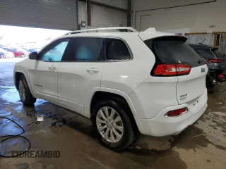 2018 Jeep Cherokee Overland z VIN 1C4PJMJX4JD614218, wystawiony jako Copart lot #69771824 z przebiegiem 59 695 mil mil oraz Szkoda całkowita • Salvage title. Historia ofert i sprzedaży dostępna na DreamBid. Obrazek 2.