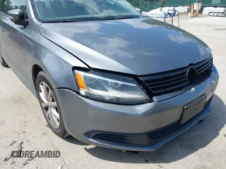 2012 Volkswagen Jetta SE z VIN 3VWDP7AJ4CM323219, wystawiony jako IAAI lot #42290353 z przebiegiem 313 663 mil mil oraz . Historia ofert i sprzedaży dostępna na DreamBid. Obrazek 16.