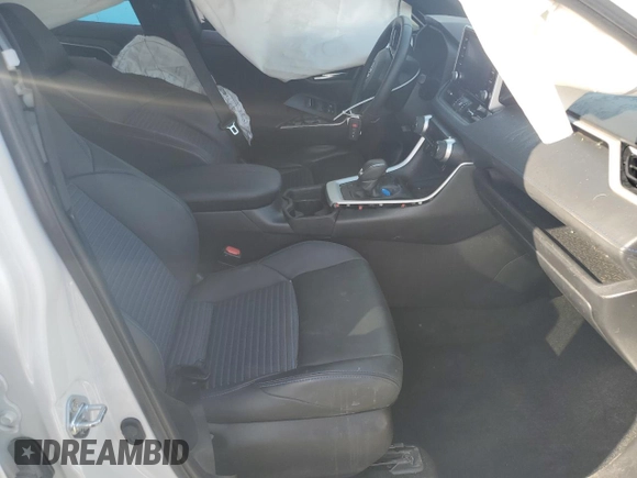 2021 Toyota RAV4 Hybrid XSE with VIN 2T3E6RFV1MW028094, listed as a Copart auction lot 52596615 with 68,497 mi miles and Salvage title. Bid and sale history available at DreamBid. Image 7.