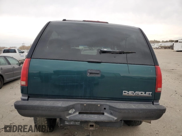 1998 Chevrolet Tahoe z VIN 3GNEK18R4WG128424, wystawiony jako Copart lot #79684984 z przebiegiem 217 456 mil mil oraz Szkoda całkowita • Salvage title. Historia ofert i sprzedaży dostępna na DreamBid. Obrazek 6.