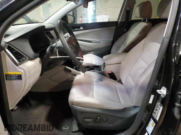 2018 Hyundai Tucson SEL z VIN KM8J3CA44JU690596, wystawiony jako Copart lot #60290475 z przebiegiem 97 512 mil mil oraz Szkoda całkowita • Salvage title. Historia ofert i sprzedaży dostępna na DreamBid. Obrazek 7.