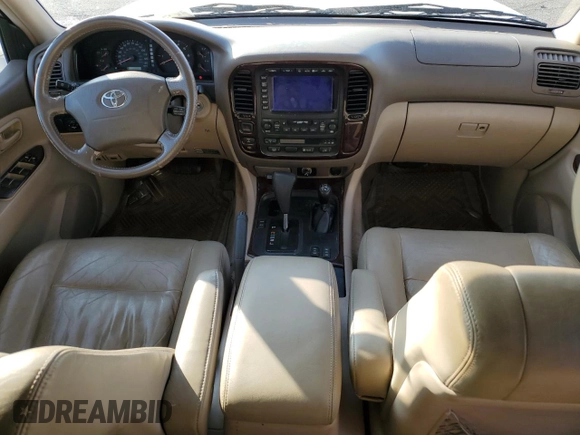 2002 Toyota Land Cruiser z VIN JTEHT05J022020635, wystawiony jako Copart lot #80284764 z przebiegiem Nie podano mil oraz Szkoda całkowita • Salvage title. Historia ofert i sprzedaży dostępna na DreamBid. Obrazek 8.