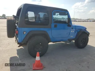 2002 Jeep Wrangler X with VIN 1J4FA39S92P776435, listed as a Copart auction lot 62792235 with 182,385 mi miles and Salvage title. Bid and sale history available at DreamBid. Image 3.