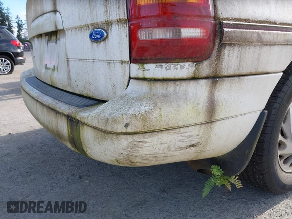 1996 Ford Windstar LX z VIN 2FMDA5142TBA56761, wystawiony jako IAAI lot #42217567 z przebiegiem 148 524 mil mil oraz . Historia ofert i sprzedaży dostępna na DreamBid. Obrazek 6.