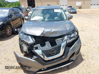 2017 Nissan Rogue S with VIN KNMAT2MV2HP543348, listed as a IAAI auction lot 42525372 with 128,842 mi miles and . Bid and sale history available at DreamBid. Image 12.