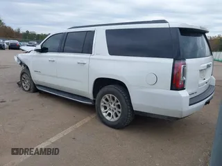 2019 GMC Yukon XL SLT with VIN 1GKS2GKC7KR165419, listed as a IAAI auction lot 40977930 with 167,195 mi miles and . Bid and sale history available at carsss.com. Image 3.