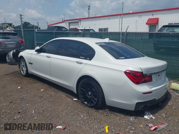 2015 BMW 7 Series 750Li xDrive with VIN WBAYF8C57FD655004, listed as a IAAI auction lot 42272205 with 77,677 mi miles and . Bid and sale history available at DreamBid. Image 3.