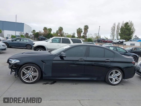 2014 BMW 5 Series 535d with VIN WBAXA5C59ED690375, listed as a IAAI auction lot 42030902 with 70,553 mi miles and . Bid and sale history available at carsss.com. Image 14.