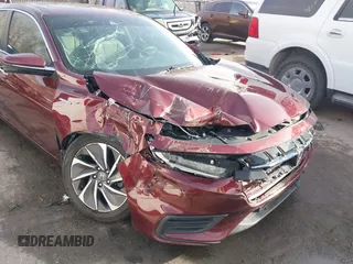 2019 Honda Insight Touring with VIN 19XZE4F95KE020308, listed as a IAAI auction lot 41814069 with 62,680 mi miles and . Bid and sale history available at carsss.com. Image 6.