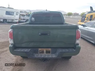 2021 Toyota Tacoma SR z VIN 3TYCZ5AN2MT049069, wystawiony jako IAAI lot #42116964 z przebiegiem 96 275 mil mil oraz . Historia ofert i sprzedaży dostępna na DreamBid. Obrazek 16.