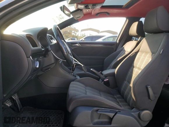 2010 Volkswagen GTI w/Sunroof with VIN WVWEV7AJ2AW239345, listed as a Copart auction lot 74179404 with 180,064 mi miles and Salvage Title. Bid and sale history available at carsss.com. Image 7.