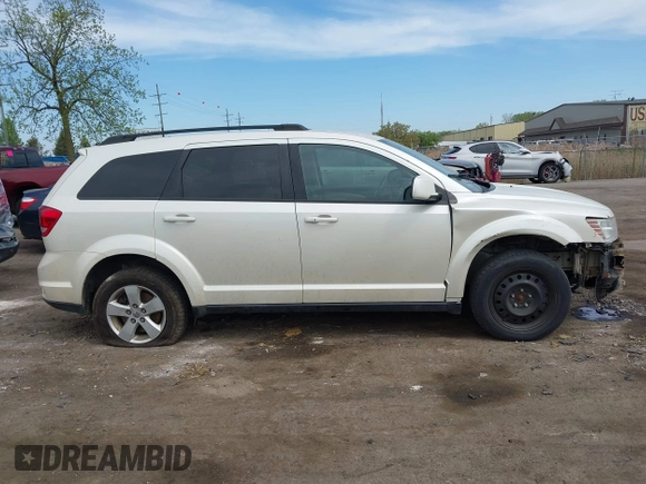 2012 Dodge Journey SXT with VIN 3C4PDCBG4CT372642, listed as a IAAI auction lot 42238499 with 172,033 mi miles and . Bid and sale history available at DreamBid. Image 14.