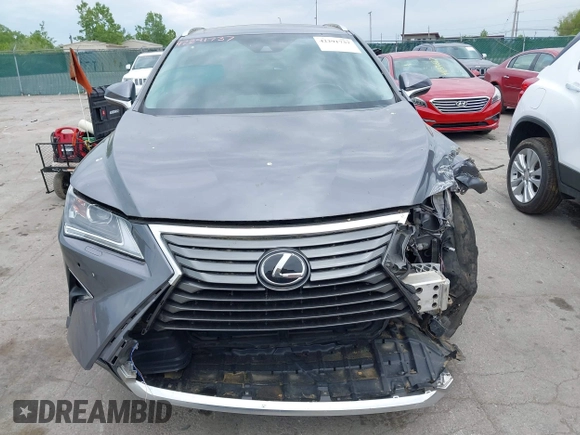 2018 Lexus RX 350 z VIN 2T2BZMCA0JC138411, wystawiony jako IAAI lot #42291737 z przebiegiem 58 725 mil mil oraz . Historia ofert i sprzedaży dostępna na DreamBid. Obrazek 13.