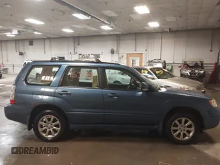 2007 Subaru Forester X w/Premium Pkg with VIN JF1SG65687G716673, listed as a IAAI auction lot 41539553 with 186,870 mi miles. Bid and sale history available at carsss.com. Image 14.