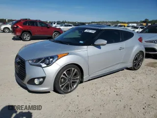 2016 Hyundai Veloster Turbo z VIN KMHTC6AEXGU261443, wystawiony jako Copart lot #84871344 z przebiegiem 107 438 mil mil oraz Szkoda całkowita • Salvage title. Historia ofert i sprzedaży dostępna na DreamBid. Obrazek 1.