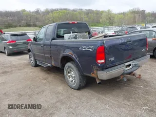 2002 Ford F-150 XL with VIN 2FTPX18L32CA67220, listed as a IAAI auction lot 42077154 with 233,409 mi miles. Bid and sale history available at carsss.com. Image 3.