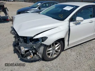 2016 Ford Fusion SE with VIN 1FA6P0HD8G5107989, listed as a IAAI auction lot 42558847 with 98,144 mi miles and . Bid and sale history available at DreamBid. Image 6.