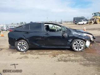 2018 Toyota Prius Two with VIN JTDKARFU7J3062094, listed as a IAAI auction lot 41648271 with 116,260 mi miles. Bid and sale history available at carsss.com. Image 14.