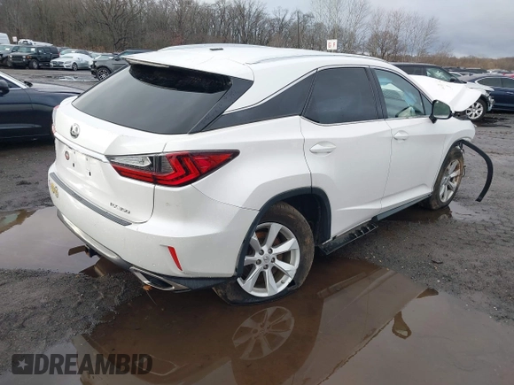 2017 Lexus RX with VIN 2T2BZMCA0HC101451, listed as a IAAI auction lot 41178229 with 61,756 mi miles. Bid and sale history available at carsss.com. Image 4.