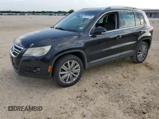 2011 Volkswagen Tiguan SEL w/Premium Navi z VIN WVGAV7AX3BW524720, wystawiony jako Copart lot #55171275 z przebiegiem 142 912 mil mil oraz Czysty tytuł • Clean title. Historia ofert i sprzedaży dostępna na DreamBid. Obrazek 1.