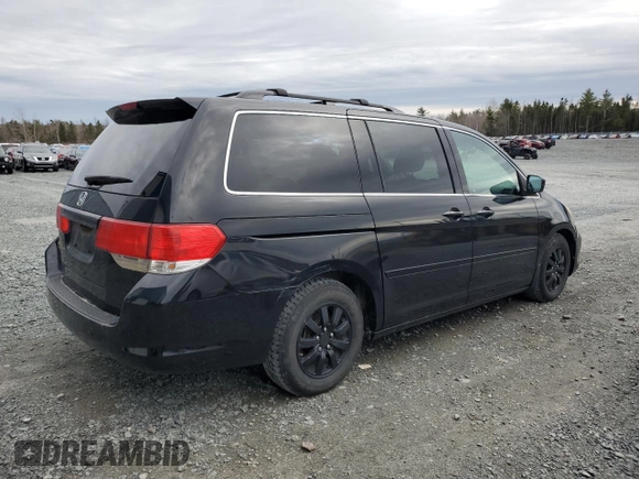 2010 Honda Odyssey EX-L with VIN 5FNRL3H63AB504781, listed as a Copart auction lot 49469045 with 200,000 mi miles and Clean Title. Bid and sale history available at carsss.com. Image 4.