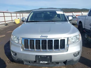 2011 Jeep Grand Cherokee 70th Anniversary with VIN 1J4RR4GTXBC718994, listed as a IAAI auction lot 41688158 with 121,680 mi miles. Bid and sale history available at carsss.com. Image 12.