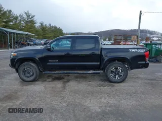 2016 Toyota Tacoma SR with VIN 3TMCZ5AN2GM027945, listed as a IAAI auction lot 41446277 with 51,781 mi miles and . Bid and sale history available at DreamBid. Image 15.