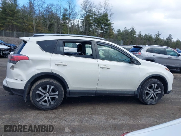 2018 Toyota RAV4 LE with VIN JTMBFREV5JJ738405, listed as a IAAI auction lot 41956145 with 100,593 mi miles and . Bid and sale history available at DreamBid. Image 14.