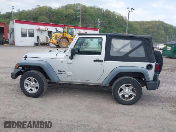 2011 Jeep Wrangler Sport with VIN 1J4AA2D18BL546069, listed as a IAAI auction lot 42139693 with 56,395 mi miles and . Bid and sale history available at carsss.com. Image 15.