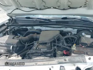 2022 Toyota Tacoma SR with VIN 3TYAX5GN2NT058909, listed as a IAAI auction lot 43113345 with 76,814 mi miles and . Bid and sale history available at DreamBid. Image 19.