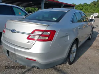2015 Ford Taurus SEL with VIN 1FAHP2E85FG174242, listed as a IAAI auction lot 42407291 with 108,852 mi miles and . Bid and sale history available at DreamBid. Image 4.