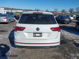 2023 Volkswagen Tiguan SE R-Line Black with VIN 3VVCB7AX8PM141998, listed as a IAAI auction lot 41278010 with 230,000 mi miles. Bid and sale history available at carsss.com. Image 17.