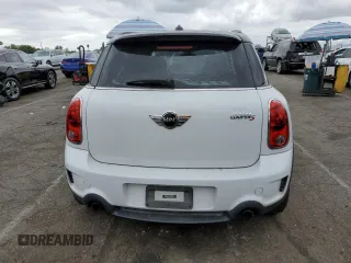 2013 MINI Countryman S with VIN WMWZC3C54DWP24877, listed as a Copart auction lot 53583655 with 97,734 mi miles and Salvage title. Bid and sale history available at DreamBid. Image 6.