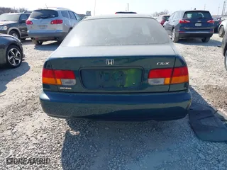 1998 Honda Civic EX with VIN 1HGEJ8249WL057484, listed as a IAAI auction lot 41776124 with 203,020 mi miles. Bid and sale history available at carsss.com. Image 16.