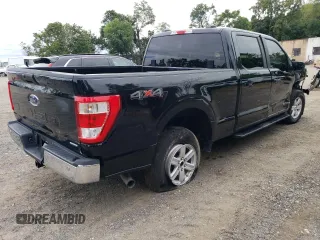 2021 Ford F-150 XL with VIN 1FTFW1ED0MFB39526, listed as a Copart auction lot 70290404 with 65,581 mi miles and Salvage Title. Bid and sale history available at carsss.com. Image 3.